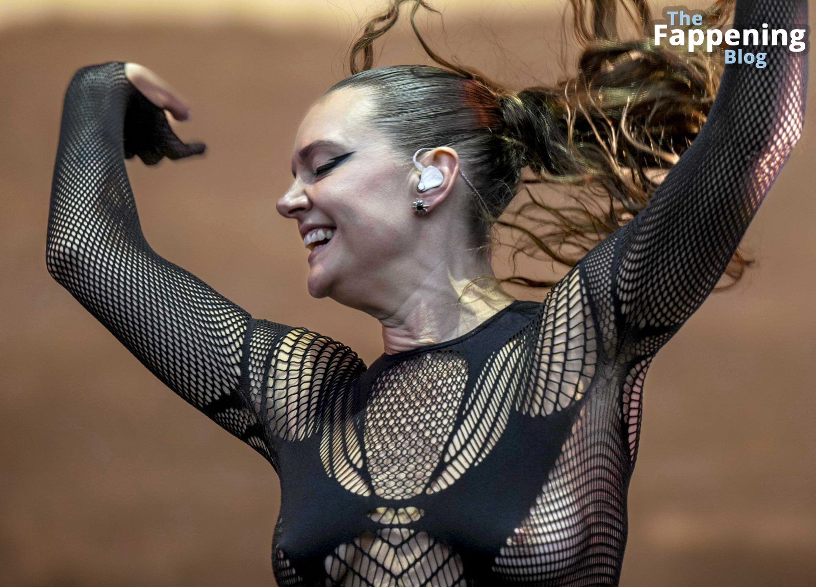 Tove-Lo-Way-Out-West-Festival-Sexy-Fishnet-Boobs-Nipples-8-thefappeningblog.com_.jpg