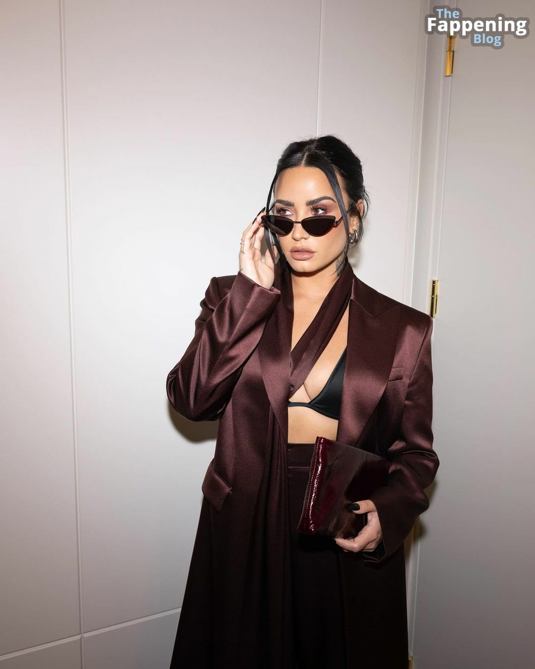 Demi Lovato Displays Her Sexy Tits at the Boss Fashion Show (12 Photos)