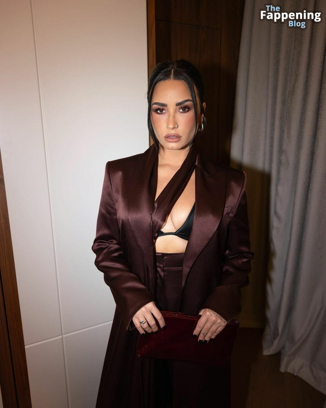 Demi Lovato Displays Her Sexy Tits at the Boss Fashion Show (12 Photos)