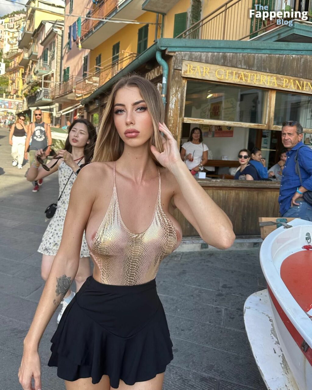 Eva Menta Flaunts Her Nude Boobs In Manarola 9 Photos Thefappening