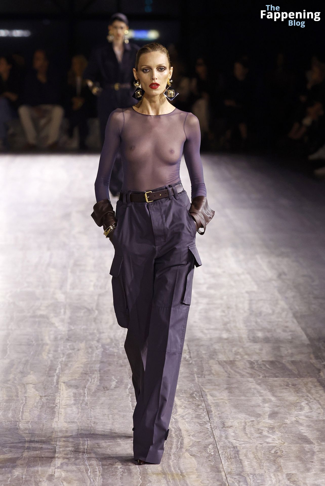 Anja Rubik Displays Her Nude Tits at the Saint Laurent Fashion Show in Paris (8 Photos)