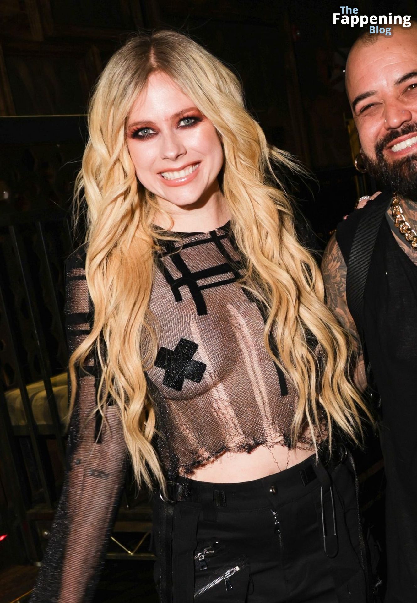 Avril Lavigne Shows Off Her Tits the 10th Anniversary Celebration of Ashton Michael Atelier (14 Photos)