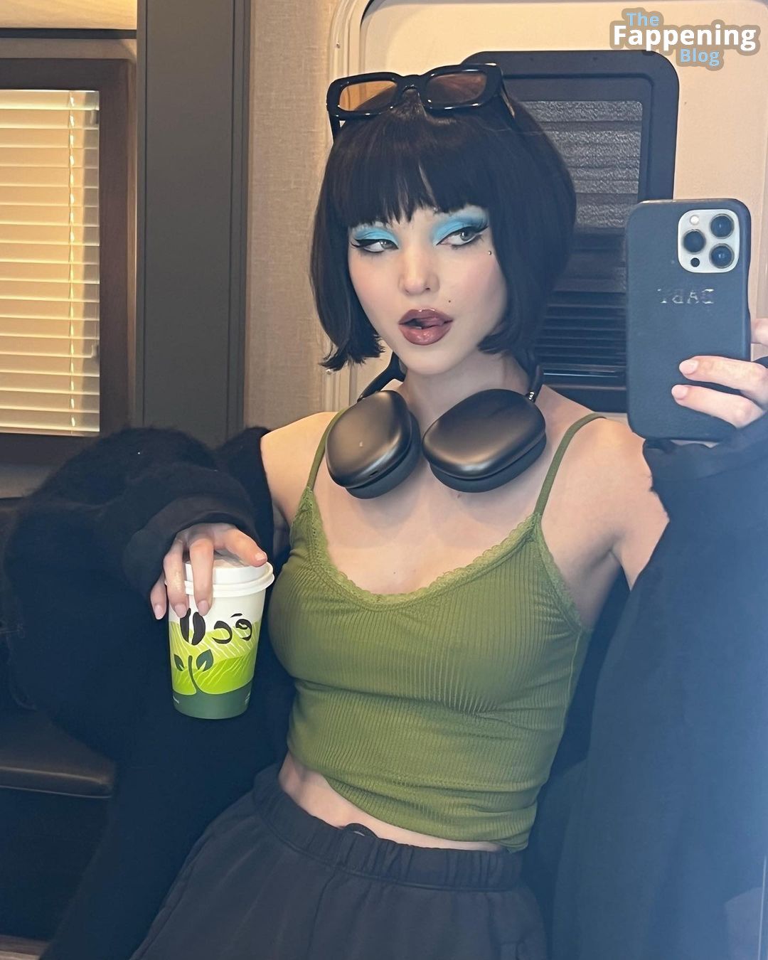 Dove-Cameron-Sexy-BLack-Wig-and-Braless-Boobs-thefappeningblog.com_.jpg