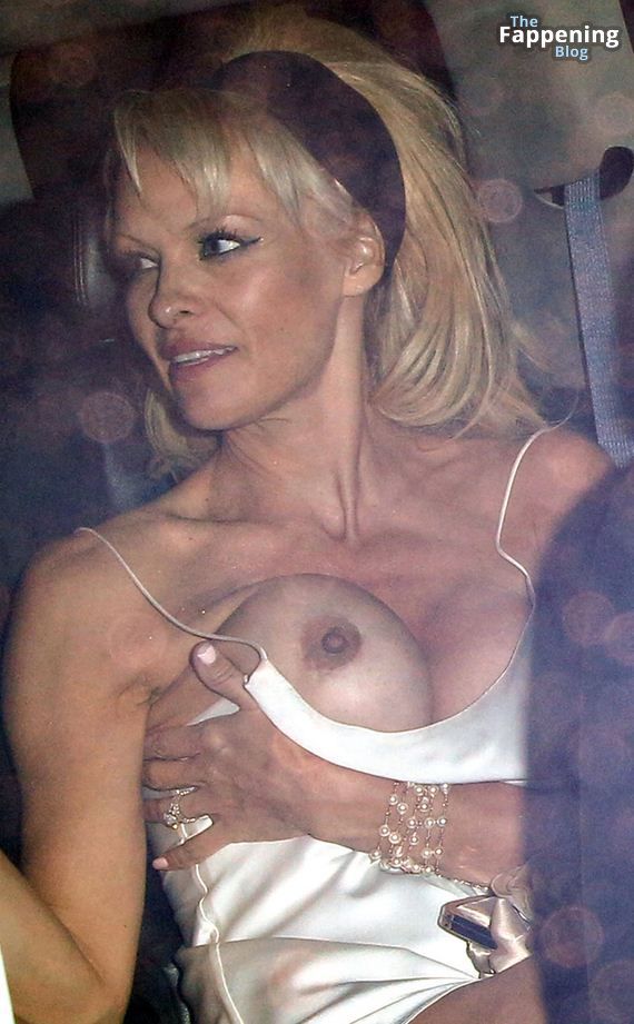 Pamela Anderson Flashes Her Nude Boob (18 Photos)