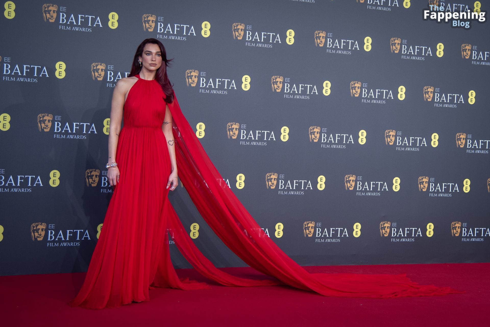 Dua Lipa Stuns in a Red Dress at the 77th British Academy Film Awards in London (78 Photos)